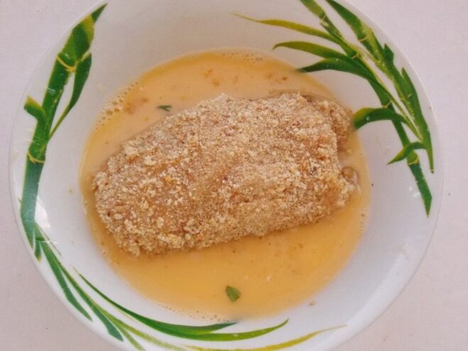 The Secret to a Crispy Crust: Double Breading Demonstrating the double breading process for Chicken Kyiv for an extra crispy crust.