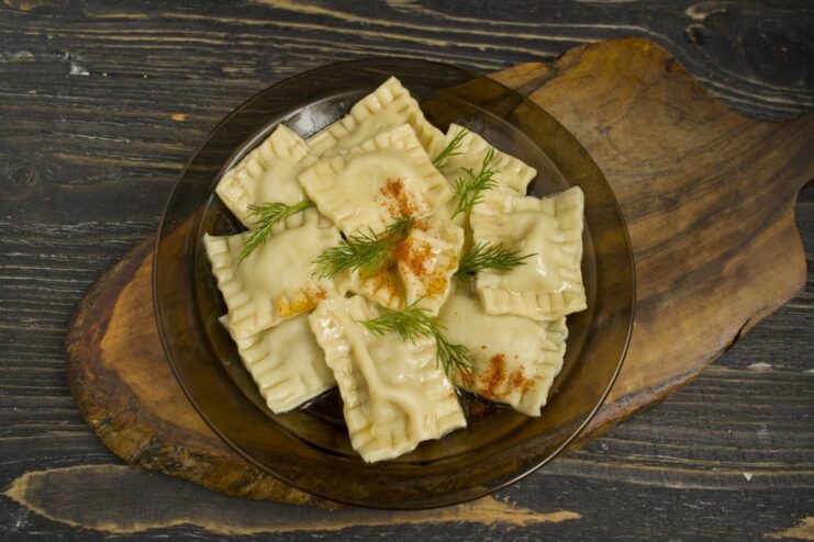 Delicious Homemade Ravioli with Meat, Ready to Serve A close-up shot of cooked meat ravioli in a bowl, ready to be eaten.