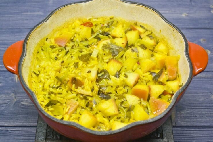 Cooking the rice until perfectly fluffy The curry rice simmering in a pot as the water is absorbed.