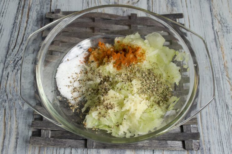 Seasoning the marinade with smoked paprika and dried thyme. Spices, including paprika and thyme, being added to the marinade.