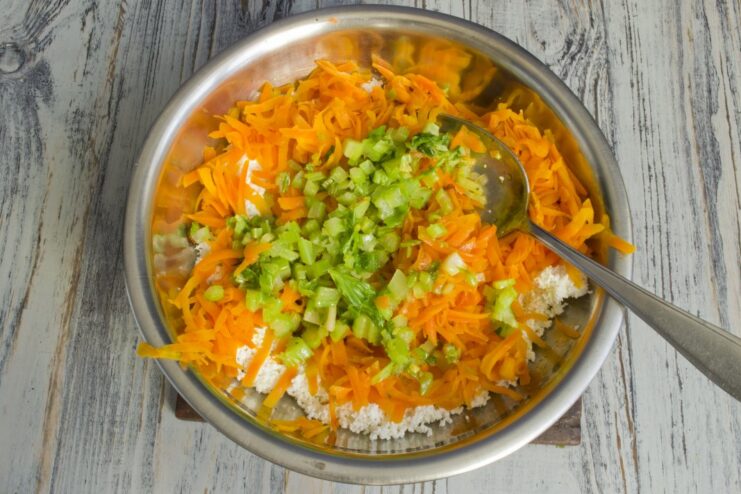 Adding sautéed chopped celery to the vegetable and cheese filling.
