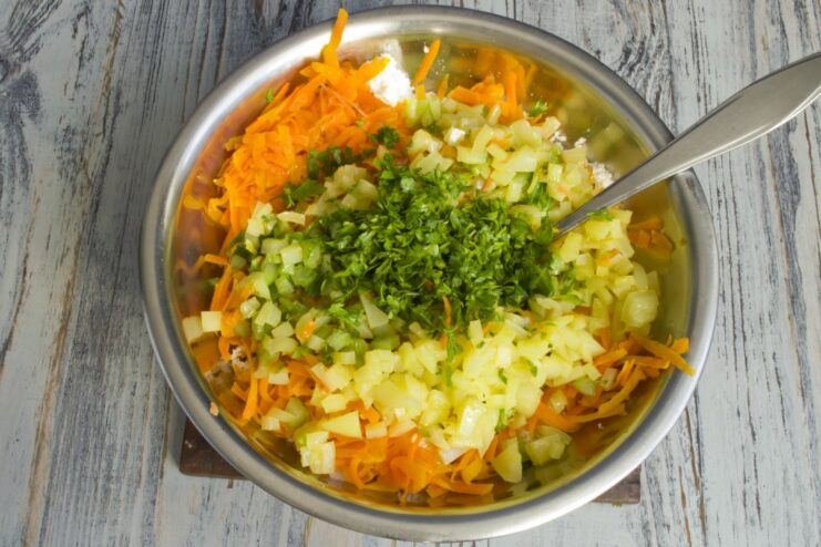Fresh chopped herbs and diced bell pepper added to the filling mixture.