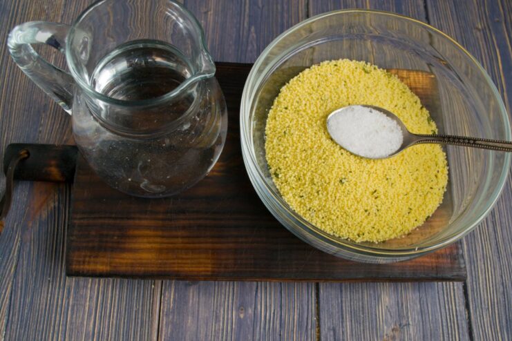 How to Prepare Fluffy Couscous Dry couscous in a pot with butter and herbs before adding hot water to let it steep.