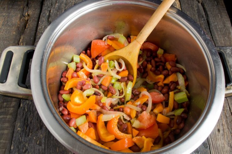 Simmering the Vegetables to Meld the Flavors The vegetable ragout simmering in a pot after being seasoned.