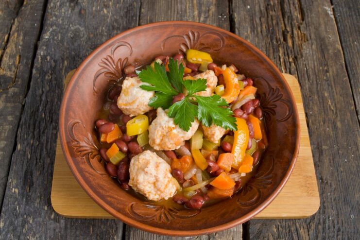 The Finished Dish: Delicious Vegetable Ragout with Chicken Meatballs A bowl of finished vegetable ragout with chicken meatballs, ready to serve.