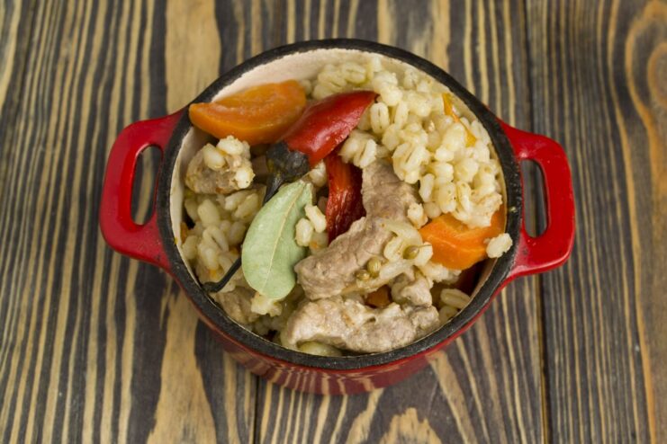 Finished Dish: Pearl Barley with Meat A serving of the finished pearl barley with meat in a white bowl.