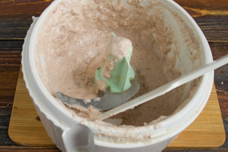 The final bazhe sauce should be creamy, smooth, and light in color. The creamy, light-colored bazhe walnut sauce after being blended.
