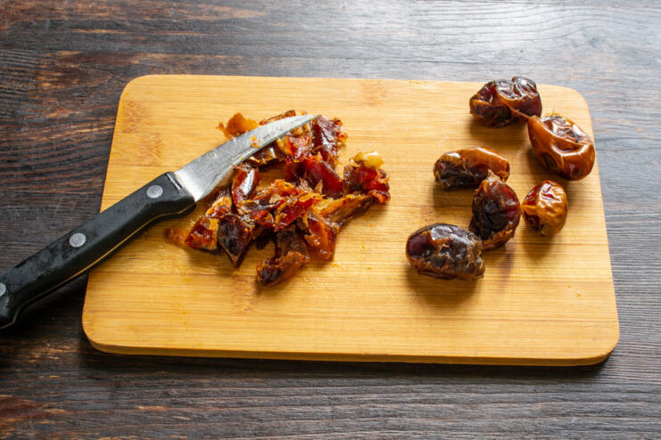 Preparing the Dates for the Homemade Mustard Finely chopped dates in a bowl, ready for the mustard recipe.
