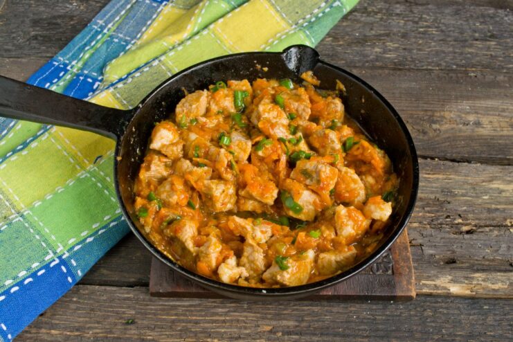 The Perfect Pork Goulash is Ready to Serve A close-up shot of the finished pork goulash with gravy in a skillet, ready to be served.