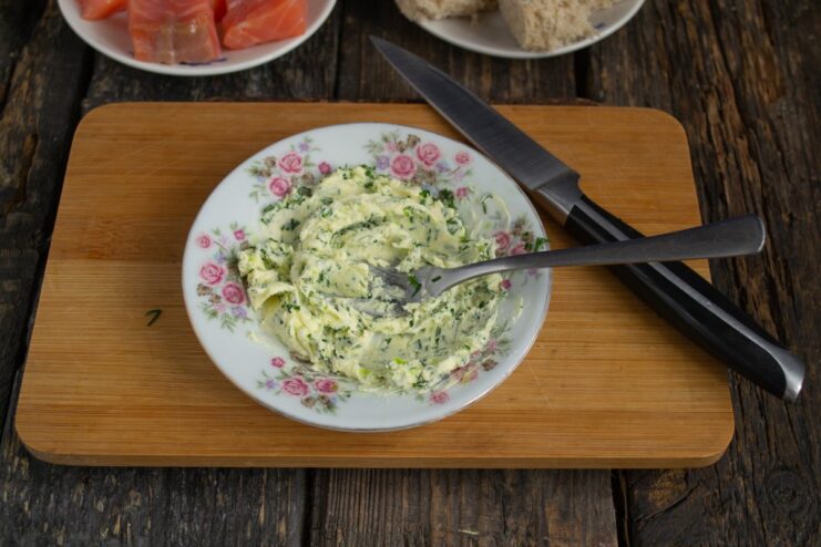 Chilling the homemade dill butter A bowl of homemade dill butter, mashed and ready to be chilled.