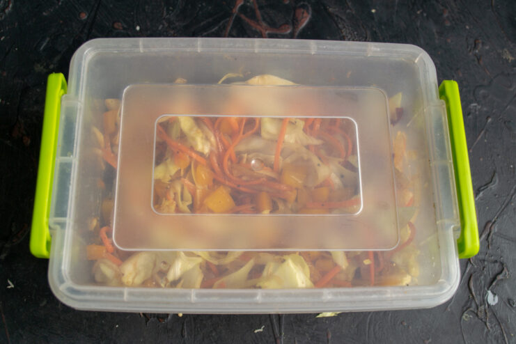 A serving of the marinated vegetable salad in a small bowl, ready to be eaten.