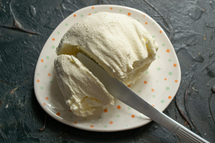 Enjoy Your Homemade Creamy Cheese! — Serve on toast, with crackers, or as a dip. A finished bowl of soft, creamy homemade cheese ready to be served.