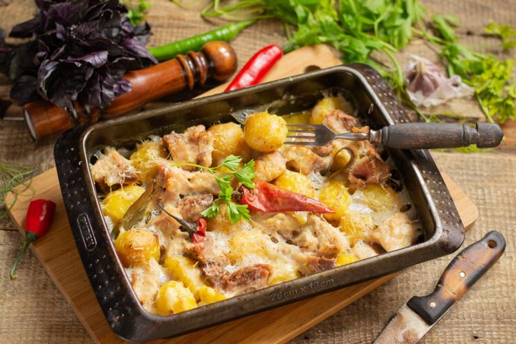 Perfectly baked until golden and delicious The finished meat and potato bake, fresh from the oven with a golden, bubbly cheese crust.