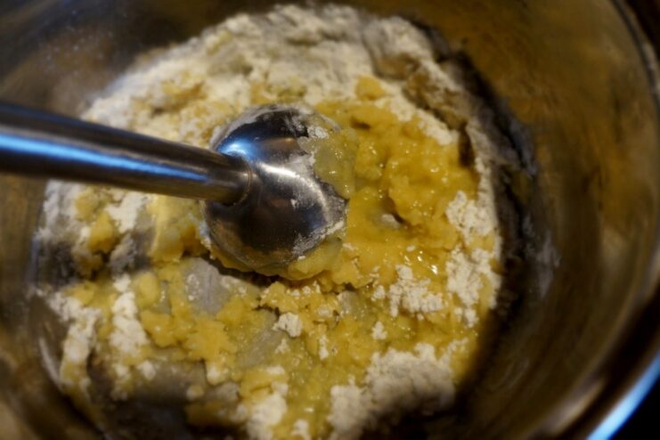 Making a smooth roux for the Béchamel sauce Flour being whisked into melted butter in a saucepan to create the roux for the Béchamel sauce.