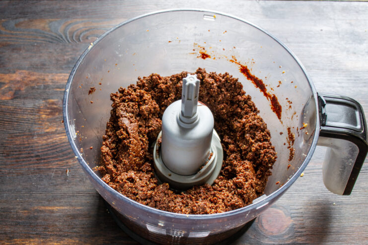 Final blending of the chocolate peanut butter All ingredients for the chocolate peanut butter being blended into a smooth, creamy consistency.