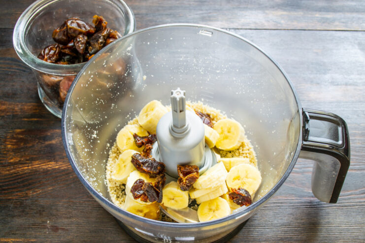 Step 3: Using Dates as a Natural Sweetener Chopped dates being added to the blender with banana and peanuts.