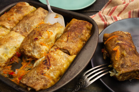 Blinchiki with Egg and Rice in Vegetable Sauce — Savory Stuffed Crepes