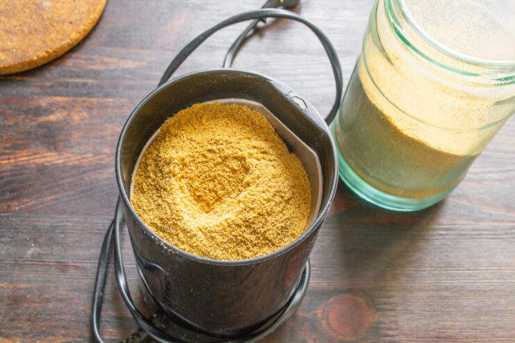 Grinding Mustard Powder for Extra Pungency Grinding yellow mustard powder in an electric coffee grinder for a finer texture.