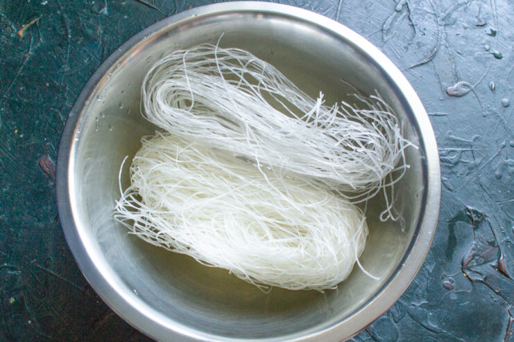 Preparing the Funchoza Noodles - They cook very quickly. A bundle of dry funchoza (glass noodles) ready to be cooked.