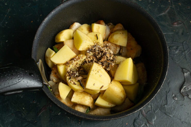 Using powdered dried mushrooms for an intense, earthy flavor boost. Dried mushrooms being ground into a fine powder.