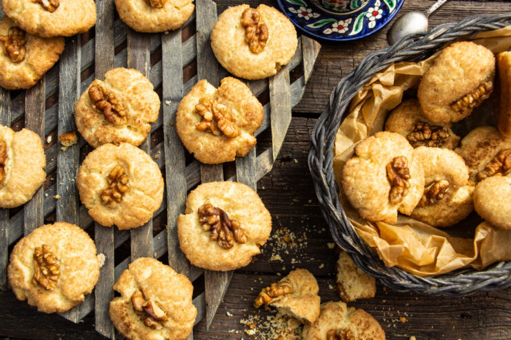 A plate of freshly baked tender walnut cookies, ready to be served.