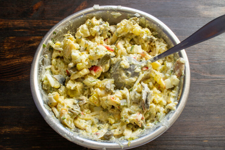 Step 10: Chilling the salad to let the flavors meld Mixing all the potato salad ingredients together in a large bowl.
