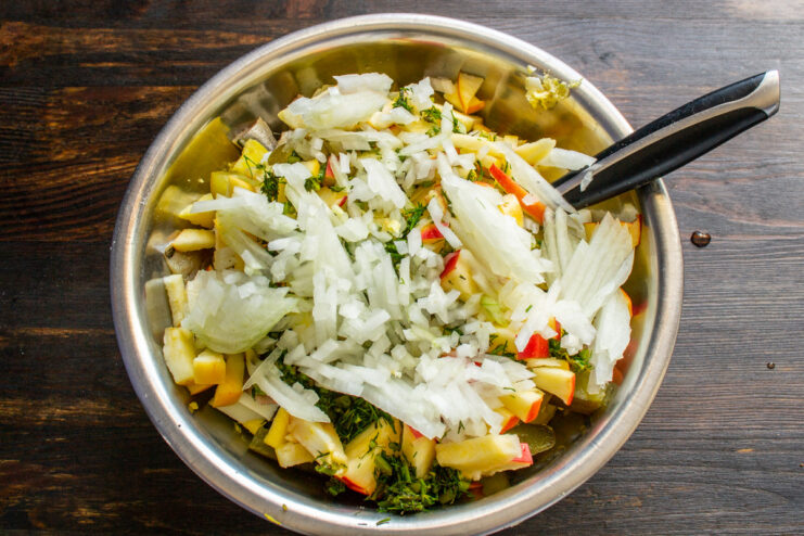 Step 8: Adding finely chopped sweet onion Finely chopping a sweet salad onion.