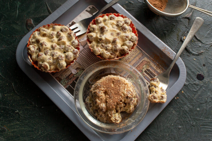 Enjoy these delicious no-bake muffins with a cup of coffee. A finished no-bake chocolate cereal muffin on a plate next to a cup of coffee.