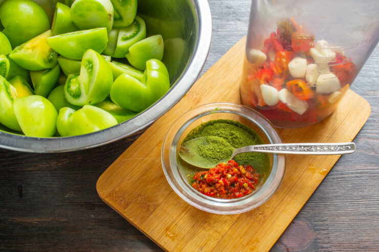 Making the Spicy Paste for Kimchi Chopped red bell pepper and other ingredients in a blender cup for the kimchi paste.