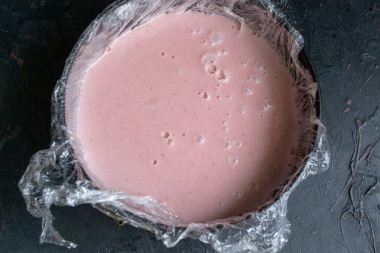 Step 11: Chilling the assembled cake until firm. The assembled no-bake strawberry cake in the springform pan, ready for chilling.