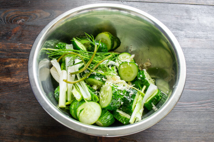 Adding Fresh Dill for Aromatic Flavor Adding several fresh green dill sprigs to the pickling mixture.