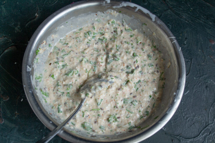 Letting the Batter Rest to Thicken The final ovsyanoblin batter mixed in a bowl, ready to rest.