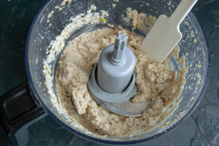 Blending the Pâté to the Desired Consistency All ingredients for the chicken pâté being blended into a smooth paste.