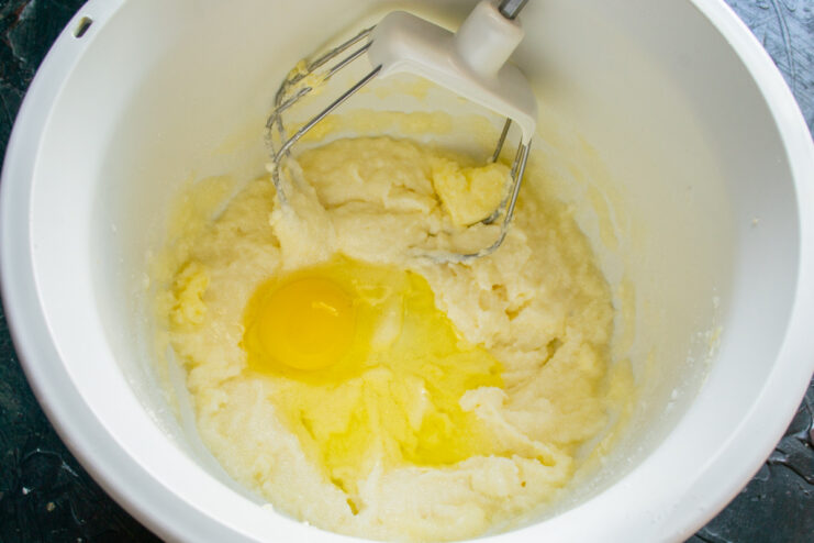 Creaming Butter and Sugar Until Light and Fluffy An electric mixer creaming butter and sugar in a glass bowl until the mixture is pale and fluffy.