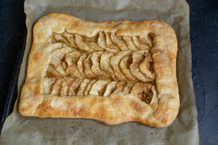 Baking the Apple Galette Until Golden Brown The apple galette baking in the oven on the middle rack.