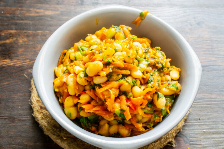 Versatile Serving Ideas: Pita or Lavash Wraps A bowl of Lenten bean ragout served with a side of bread.