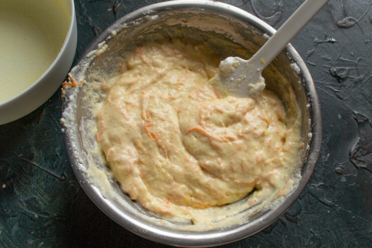 The Perfect Light and Airy Casserole Batter A close-up of the final light, airy, and smooth casserole batter in a glass bowl.