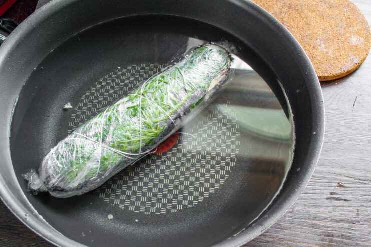 Step 7: Preparing the Pot for Boiling the Mackerel Roll A large pot filled with water, ready for cooking the mackerel roll.