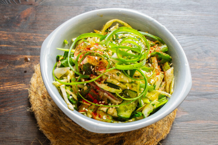 Ready to serve: fresh spring salad The finished spring green onion salad served in a bowl, ready to eat.