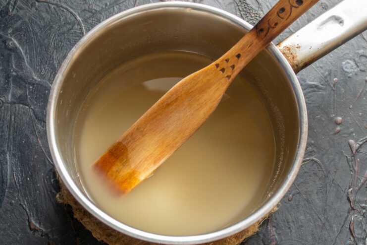Preparing the Agar-Agar for the Zefir Syrup Agar-agar powder in a small saucepan with water.