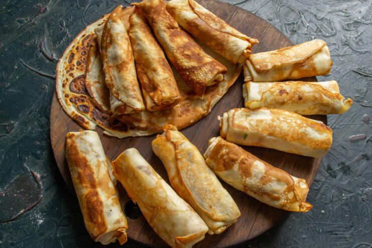 Enjoy Your Homemade Potato and Tvorog Blinchiki! A close-up shot of delicious, ready-to-eat blinchiki with potato and tvorog.