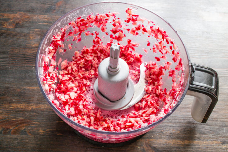 Blending the Ingredients Until a Paste Forms Blending horseradish, beets, and seasonings in a food processor until finely ground.