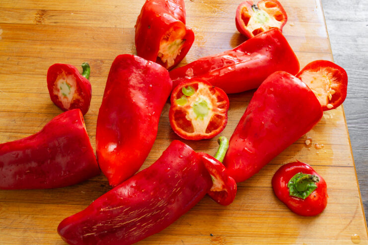 How to Prepare Peppers for Stuffing: Removing Tops and Seeds Preparing bell peppers for stuffing by removing the tops and seeds.