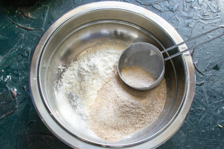 Combining Flours for the Tarte Tatin Crust Two types of flour, cake flour and whole wheat flour, in a mixing bowl.