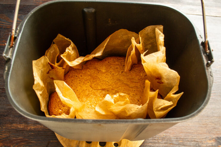 Step 9: Letting the cake rest after baking. The fully baked condensed milk cake inside the bread machine.