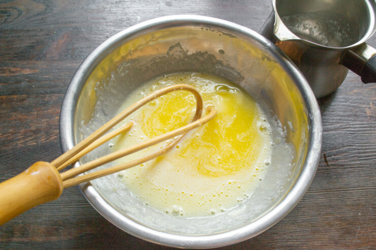 Preparing to melt the butter for the muffins Cubed butter in a small saucepan before melting.
