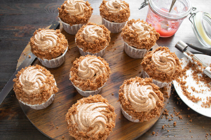 Step 9: Piping chocolate mascarpone frosting onto the cupcakes Piping rich chocolate frosting onto a Coca-Cola cupcake.