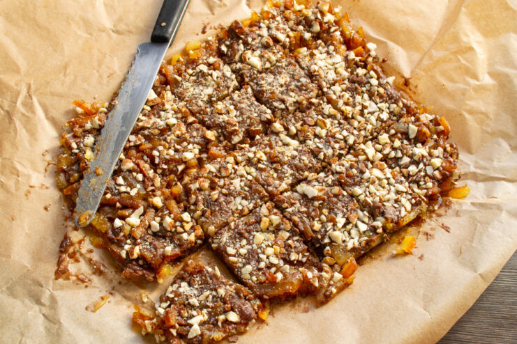 Chilling the Candies to Set the Chocolate A baking sheet with the finished orange peel candies ready to be chilled.