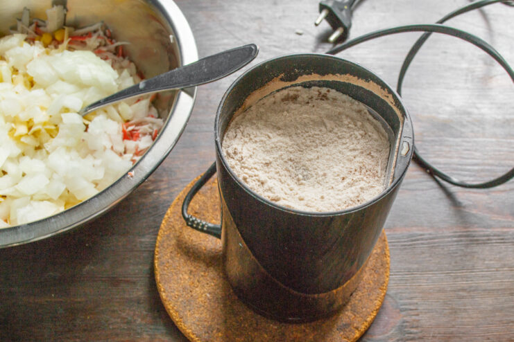 How to Make Homemade Rice Flour White rice grains inside a coffee grinder to make homemade rice flour.