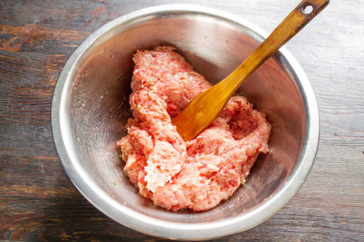 Choosing the Right Ground Meat for Lazy Cabbage Rolls A bowl of fresh ground meat, a key ingredient for lazy cabbage rolls.